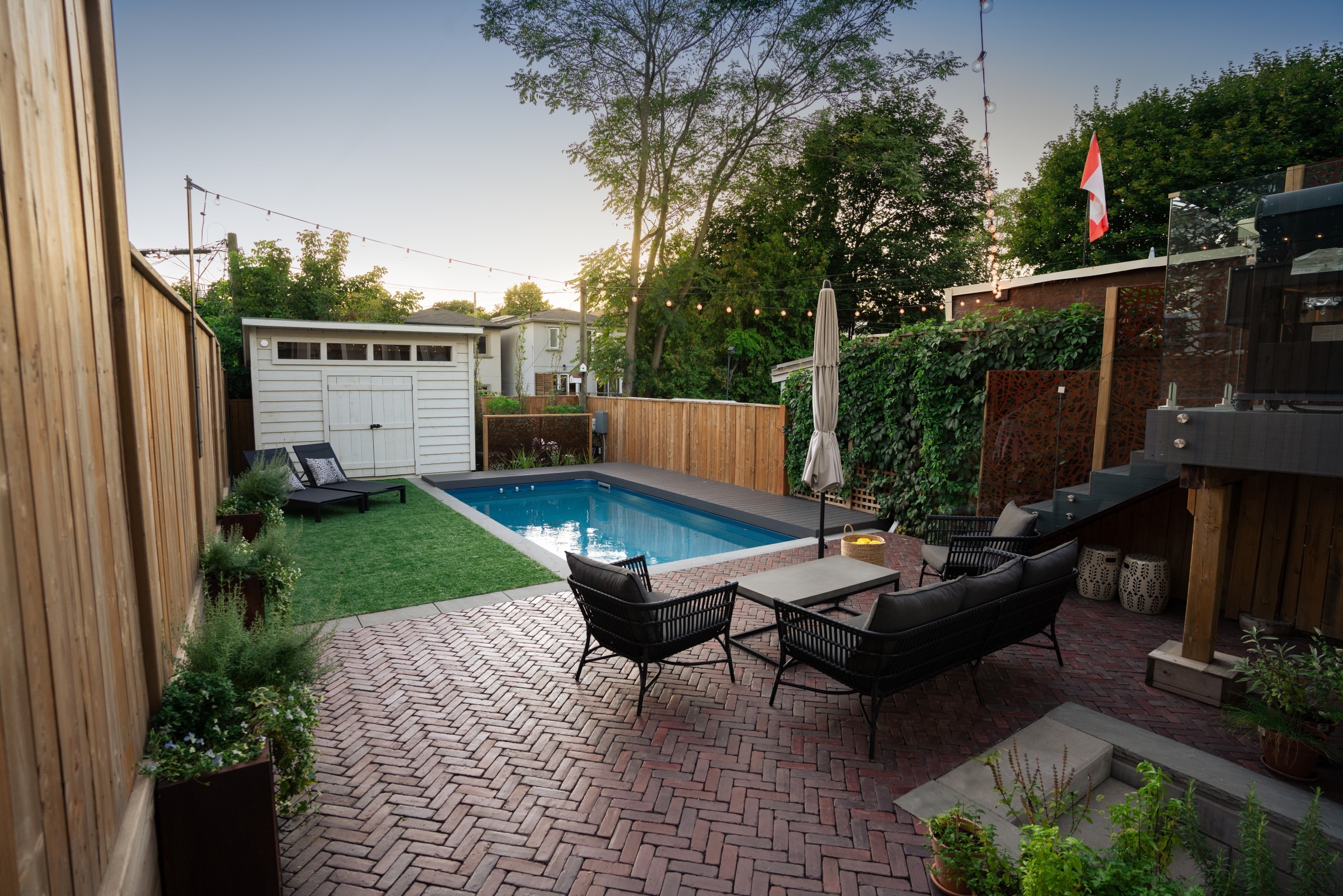 Outdoor space with a pool and beautiful setup